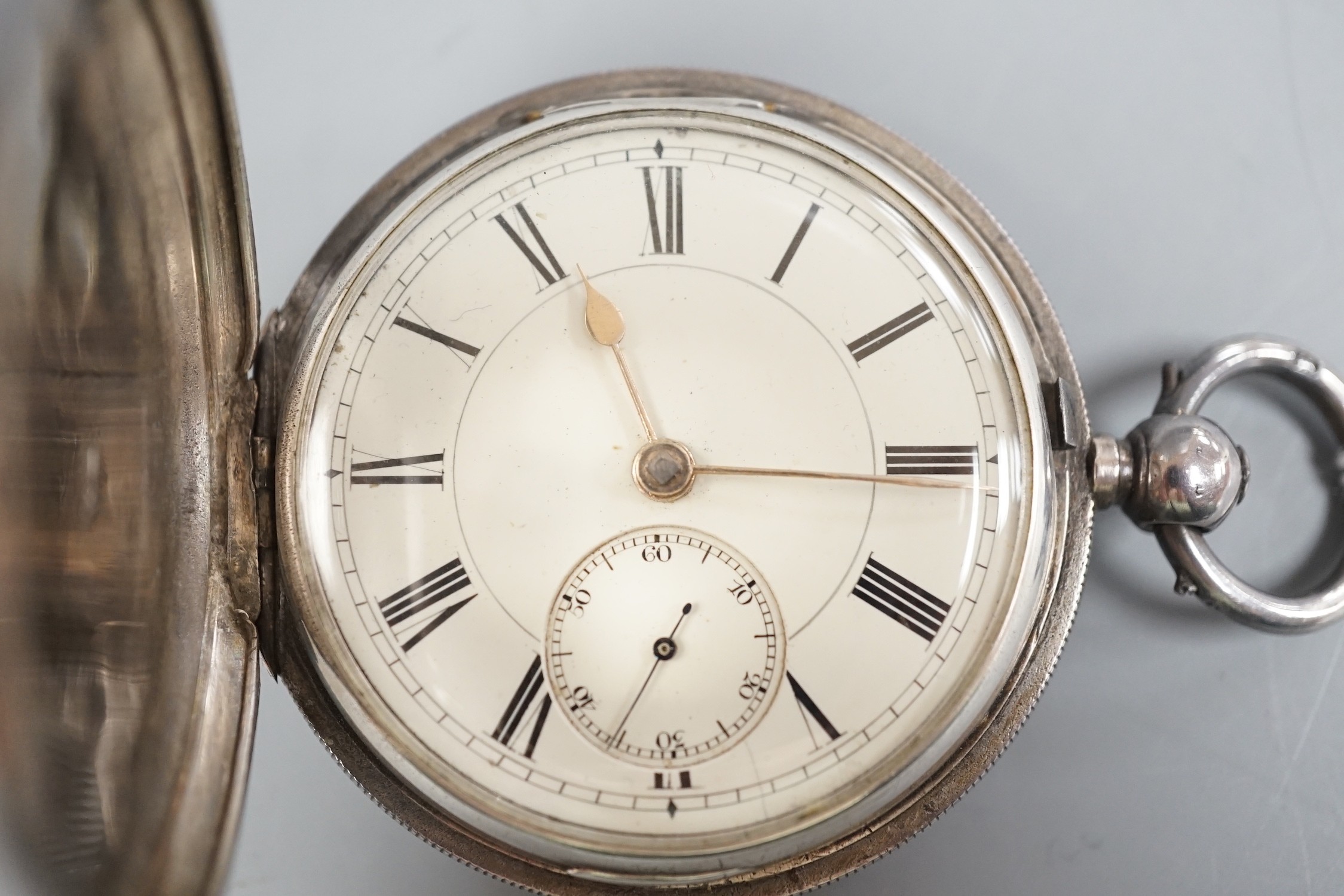 A Victorian silver hunter keywind pocket watch, with Roman dial and subsidiary seconds, by Robert Reid, Bristol, with key.